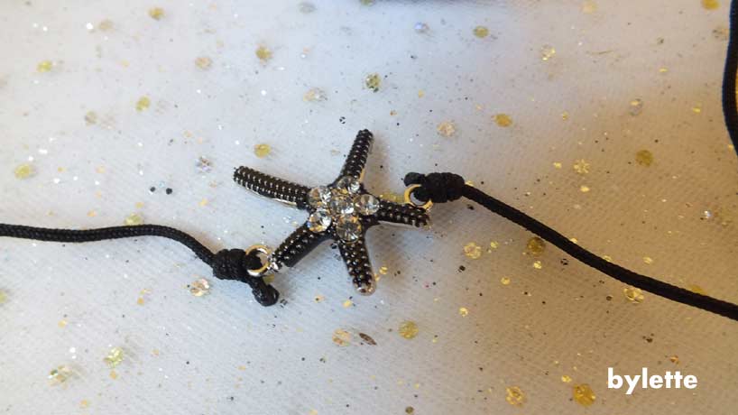 Adjustable black starfish wire bracelet